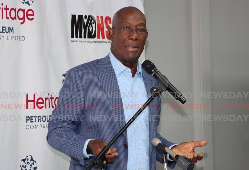 The Prime Minister speaks at the launch of the Industrial Apprenticeship Mechanical Programme (I-MAP) at the Heritage Industrial compound, Santa Flora on March 25. - Photo by Ayanna Kinsale 