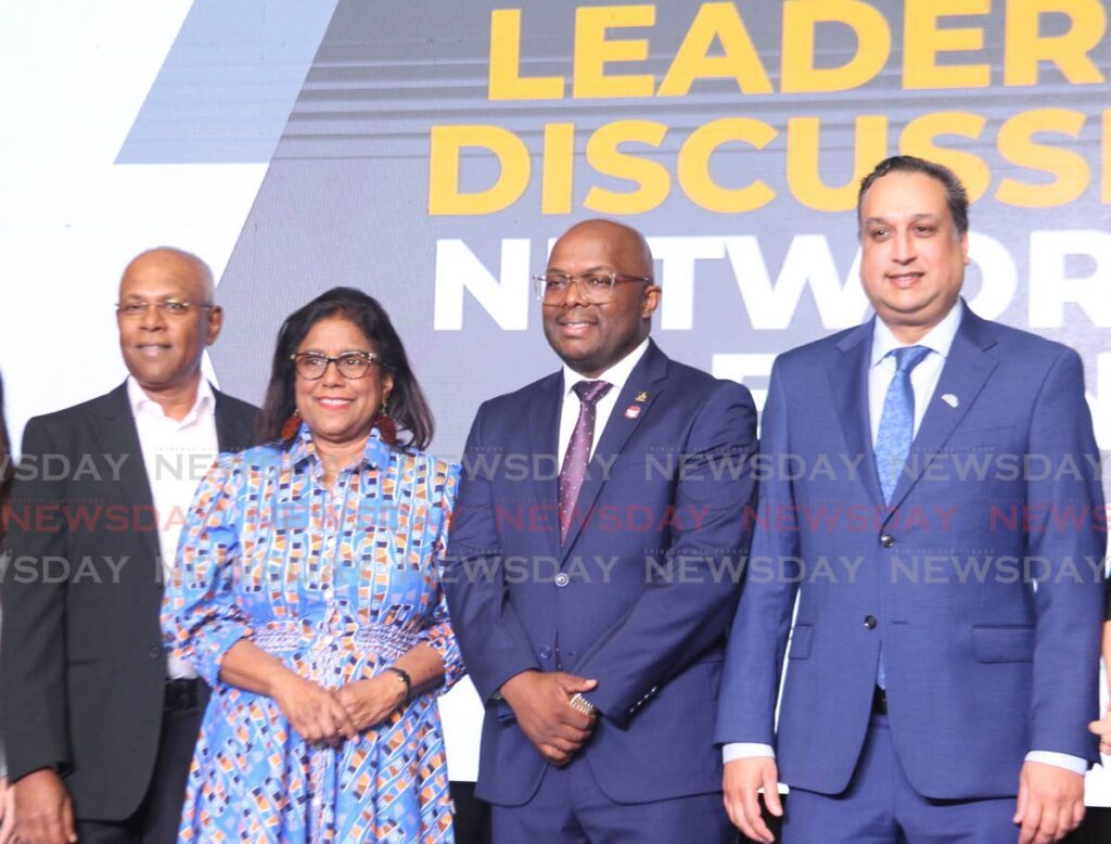 Pradeep Subrian, CEO at Blue Waters Products Ltd, left; Paula Gopee-Scoon, Minister of Trade and Industry; Roger Roach, newly-elected TTMA president and Navin Dookeran, CEO at Export Import Bank of TT at the TTMA leadership discussion and networking event at Hyatt Regency, Port of Spain on March 26. - Photo by Faith Ayoung