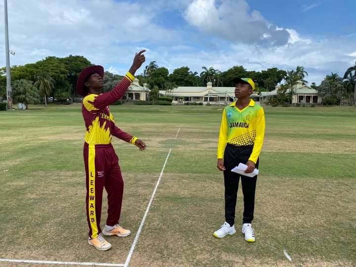 Leeward Islands captain J'Quan Athanaze (L) and Jamaica captain Demario Hall take the toss ahead of their teams' West Indies Rising Stars under-15 Championship match at the Coolidge Cricket Ground in Antigua on March 26. 