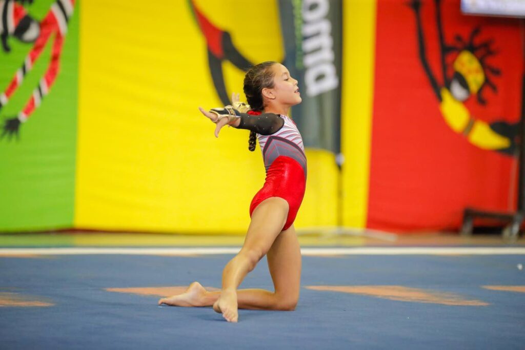 Bren Newallo of Tots and Tumblers competes in the level three floor exercise. - courtesy Richard Lyder.