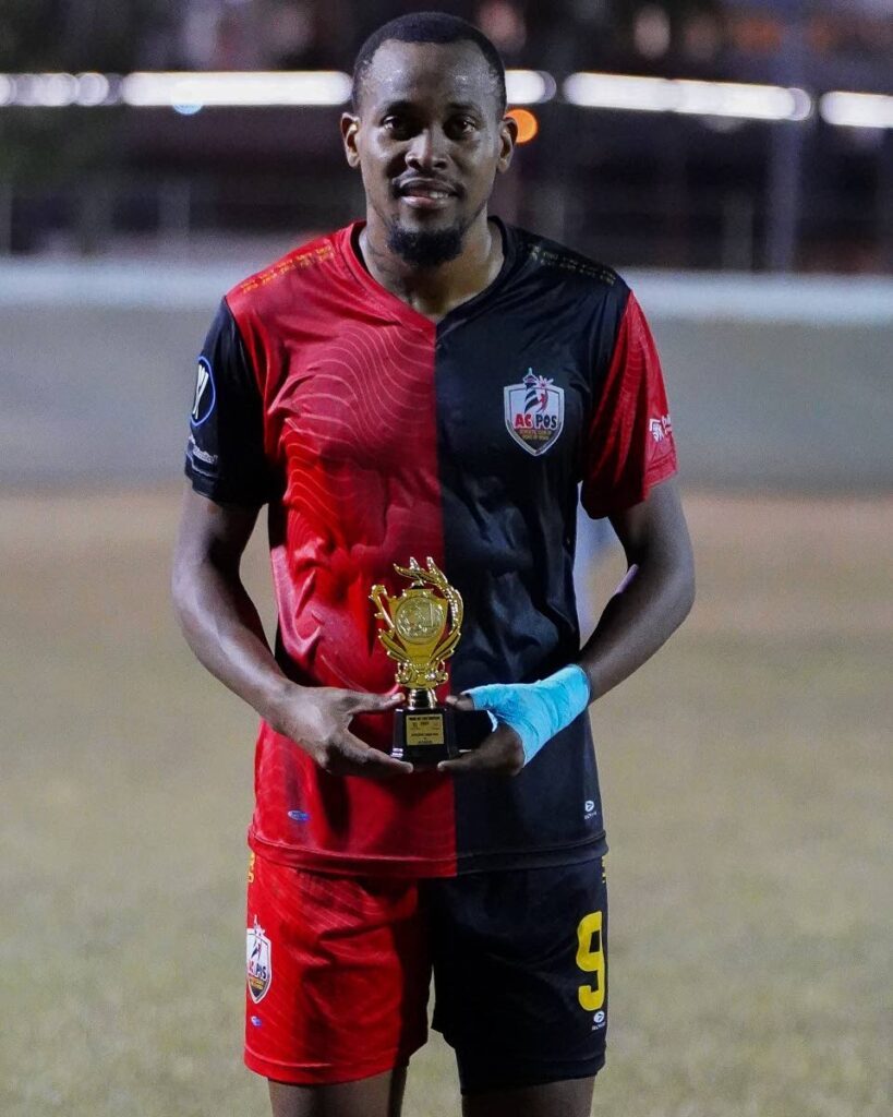 Grenadian striker and AC PoS player Jamal Charles with his Man-of-the-Match award after his team’s 2-1 win TTPFL win over Eagles FC on March 27. Photo courtesy TTPFL.  - 