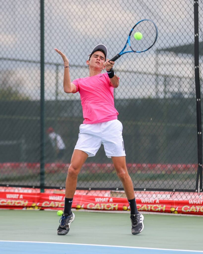 Kale Dalla Costa plays a return shot to Beckham Sylvester during the TT Tennis Association's Catch Junior Tennis National Championships Boys' 18 and under singles final at the National Racquet Centre on March 28, 2023 in Tacarigua.  - Daniel Prentice