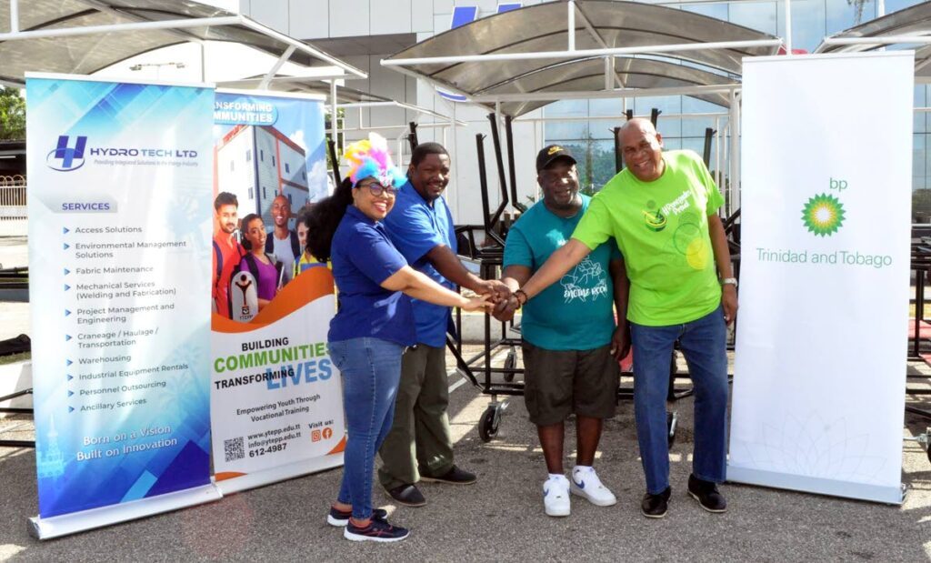 Celebrating the partnership that saw the construction of pan racks for Mayaro Cadenza Steel Orchestra are (from left): Michelle DeFreitas, procurement officer, Hydro Tech Limited;  Fabian Perez, Manager, YTEPP;  Charles ‘Charlo’ Hills, Cadenza’s founder and manager; and Matthew Pierre, community liaison officer, bpTT. 