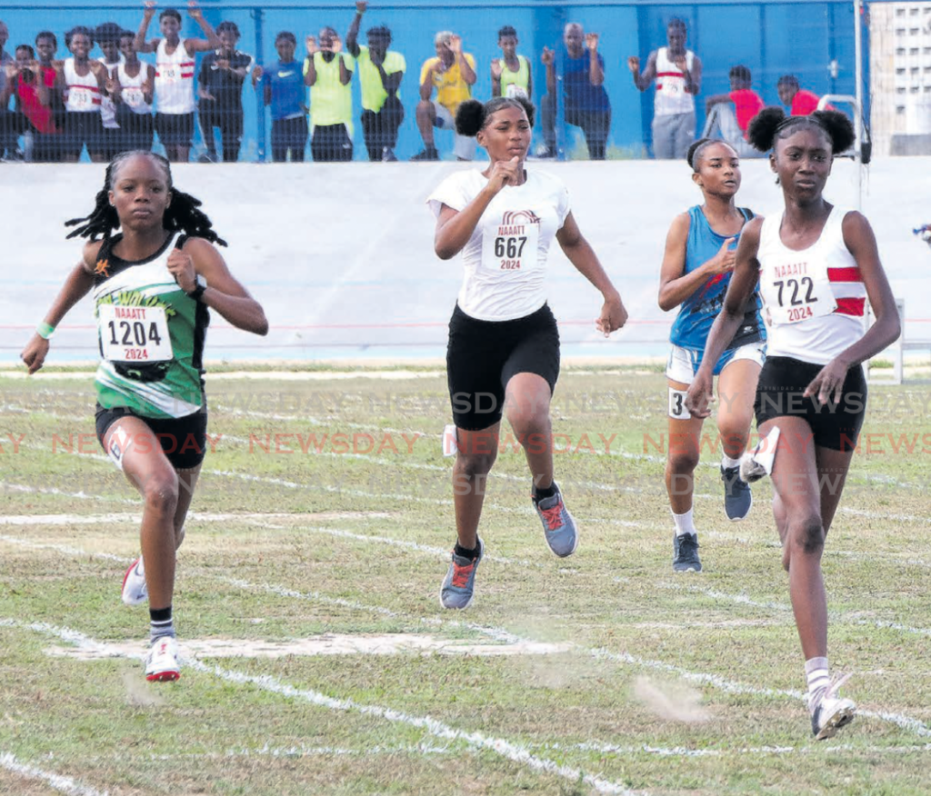 Participants take part in the girls’ under-15 80-metre dash during the
Southern Games, Skinner Park, San Fernando, on Saturday.
PHOTO BY AYANNA KINSALE