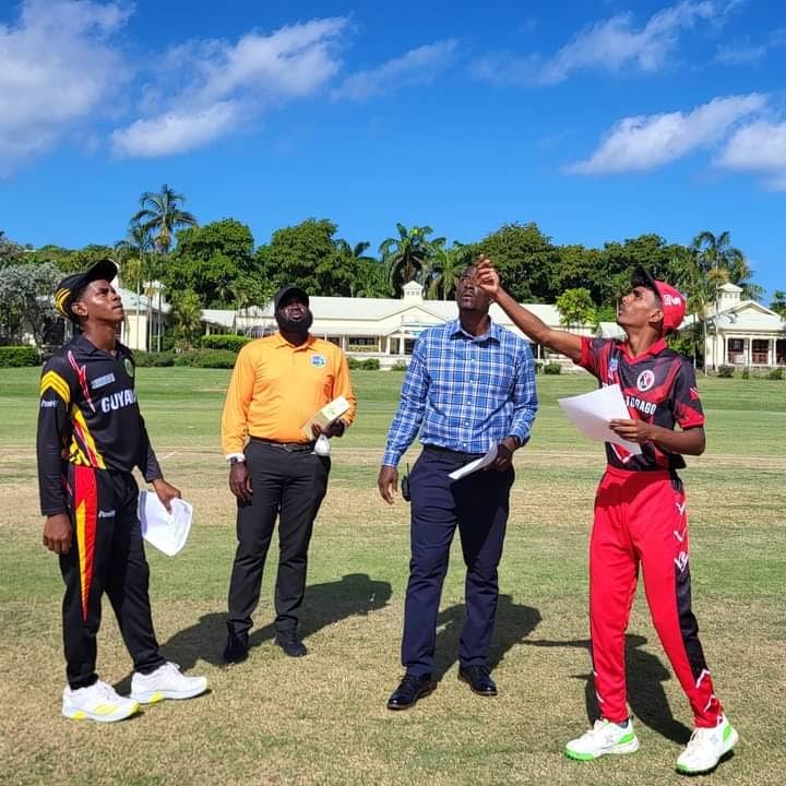 (FILE) Guyana captain Adrian Hetmyer (L) and TT captain Zane Maraj take the toss ahead of their 2024 West Indies Rising Stars under-15 Championship match at the Coolidge Cricket Ground, Antigua on March 25.  Photo courtesy Windies Cricket.  - 