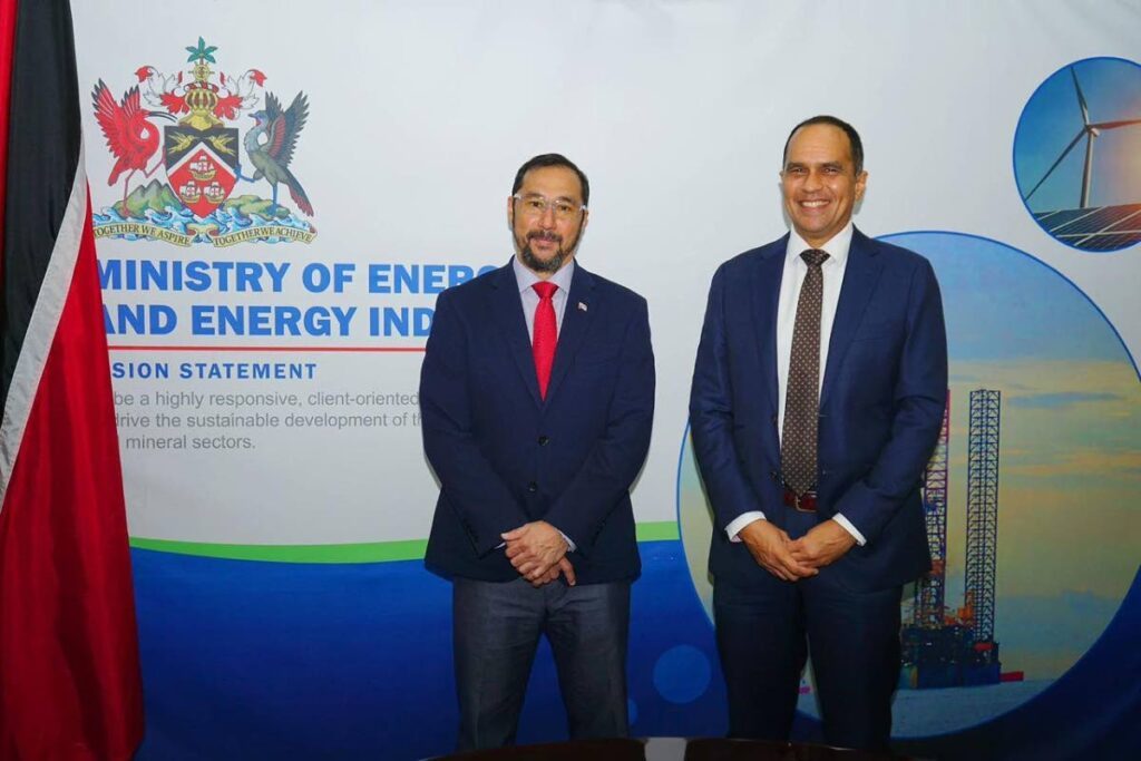 Energy Minister Stuart Young, left, meets Methanex TT managing director and president Colin Bain on April 3. - Photo courtesy MEEI