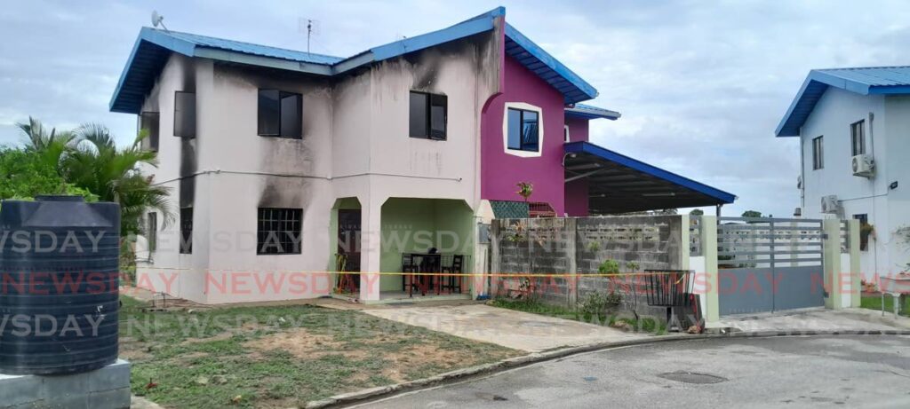 The house in Exchange Village, Couva where Tyrone “Stephon” Foster died. His uncle, Lester Foster, later succumbed to his injuries. - Photo by Rishard Khan