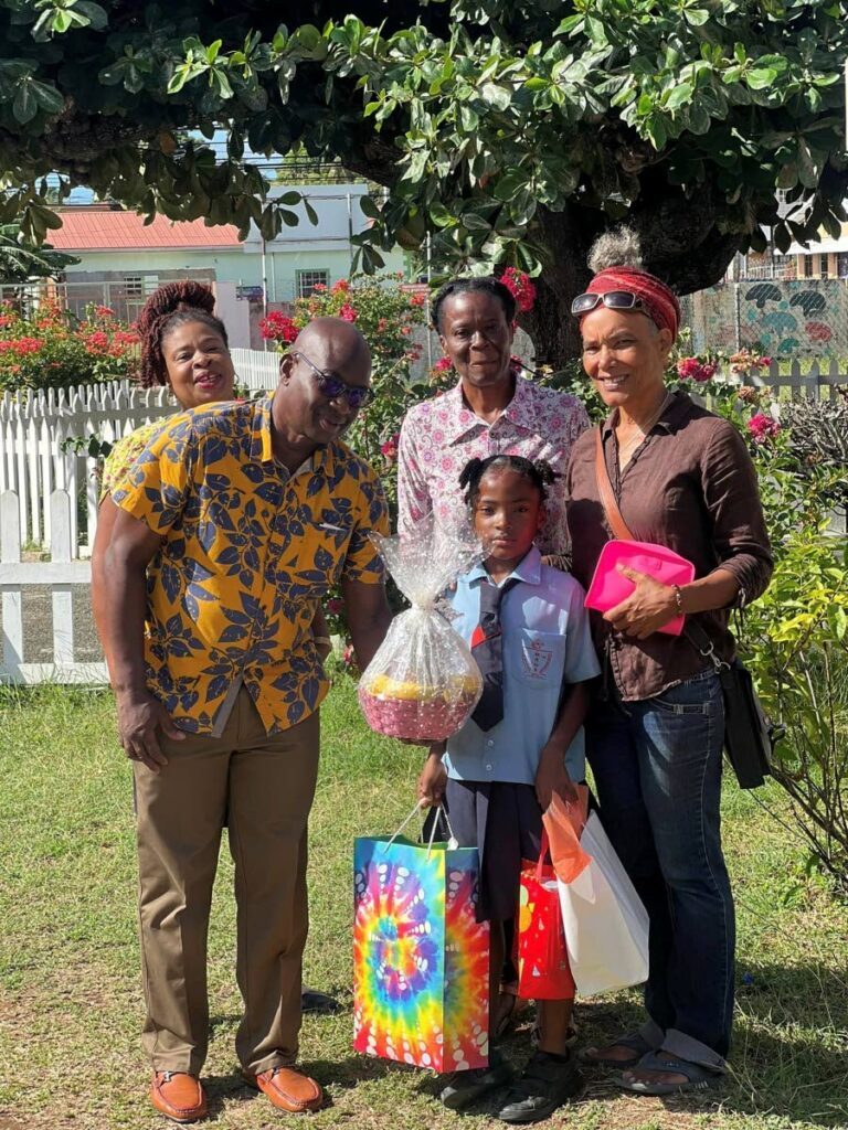 From left, Bon Accord Primary School
principal Desma Frank, (back), Vernon
Roberts, Hazel Ann George, Hidaya Cave
and Elspeth Duncan during the presentation
of hampers at the school. - Photo courtesy Bon Accord Primary School