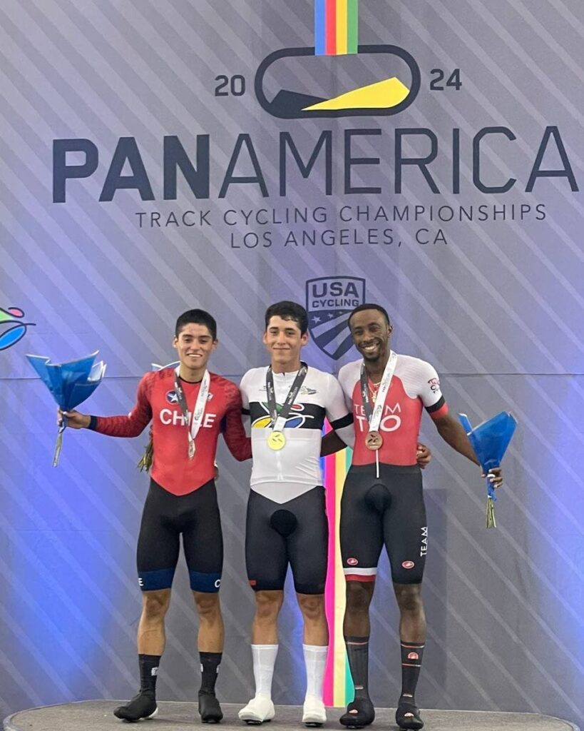  Mexican gold medallist Gabriel Fernando (C), Chilliean silver medallist Nava Romo (L) and TT bronze medallist celebrate after their Pan American Track Cycling Championships men's scratch race, on Wednesday, at the Velo Sports Centre, Los Angeles.  - 
