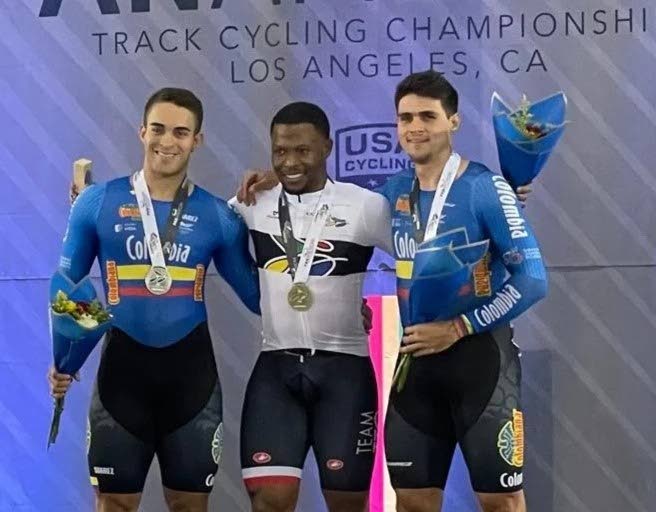 Trinidad and Tobago's Nicholas Paul, centre, with his Pan Am Cycling sprint gold medal alongside runner-up Colombian Cristian Ortega, left, and his compatriot Santiago Ramirez. - 