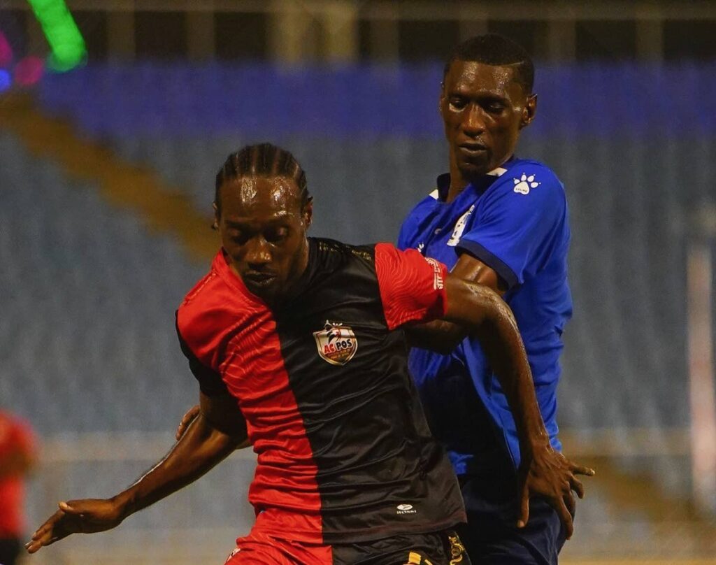 Action between AC Port of Spain and Police in the TT Premier Football League at the Hasely Crawford Stadium, Mucurapo, April 7.  - TTPFL