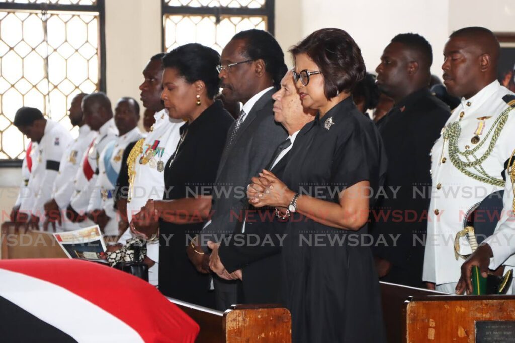 Former President of Trinidad and Tobago (first from left) Paula-Mae Weekes, Minister of National Security Fitzgerald Hinds, Minister of Finance,  Colm Imbert and current President of Trinidad and Tobago (first from right)  Christine Kangaloo attend the funeral of the Major General Ralph Brown at All Saint's Anglican Church in Port of Spain on April 8. - Photo by Venessa Mohammed