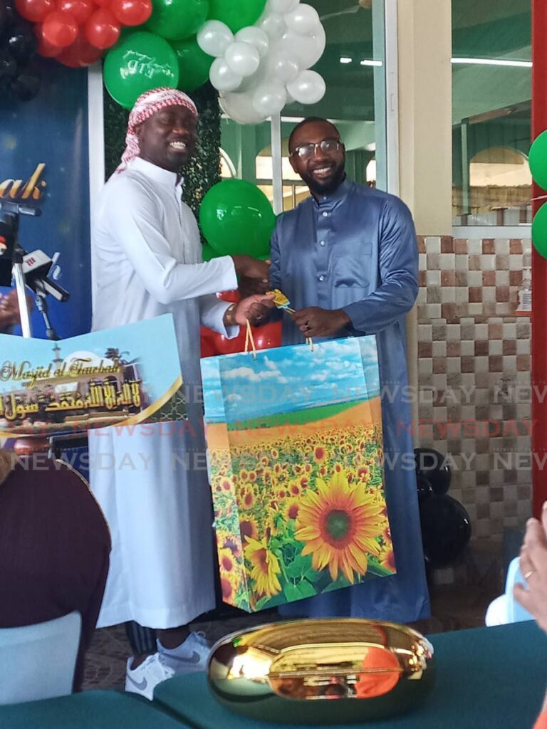 Chief Secretary Farley Augustine, left, and THA minority leader Kelvon Morris at the  Masjid Al Tawbah, Hampden, Lowlands, Tobago, on April 10. - Photo by Corey Connelly
