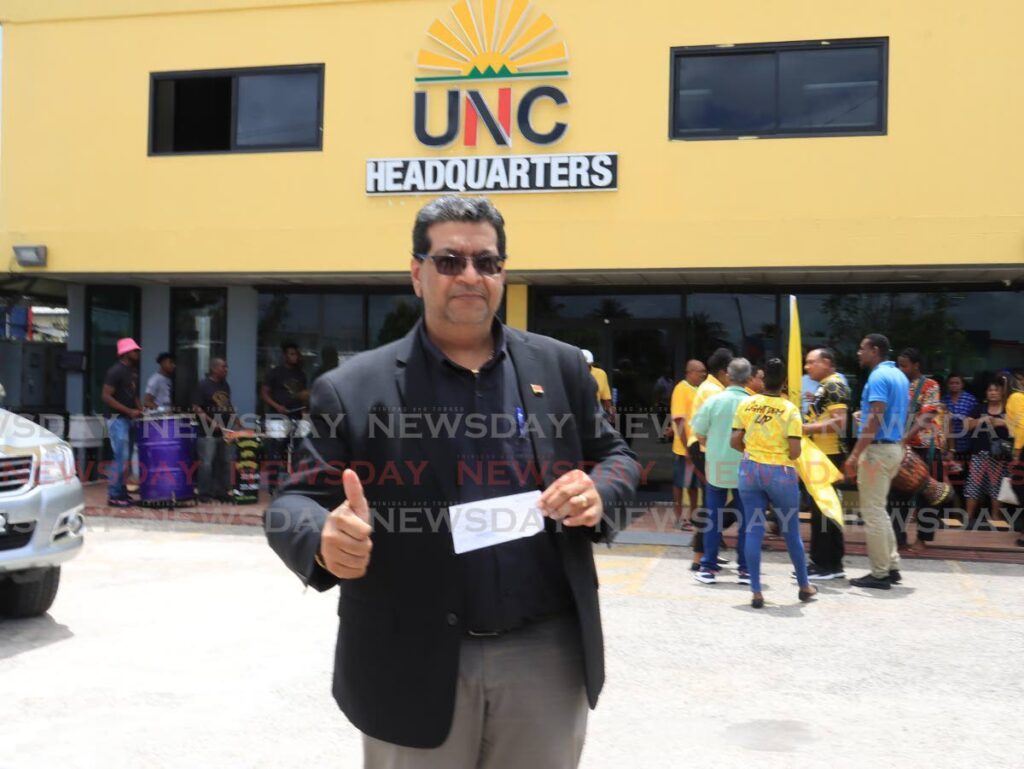 Rushton Paray shows his receipt after filing his nomination papers at the UNC headquarters in Chaguanas on April 11. - Photo by Roger Jacob