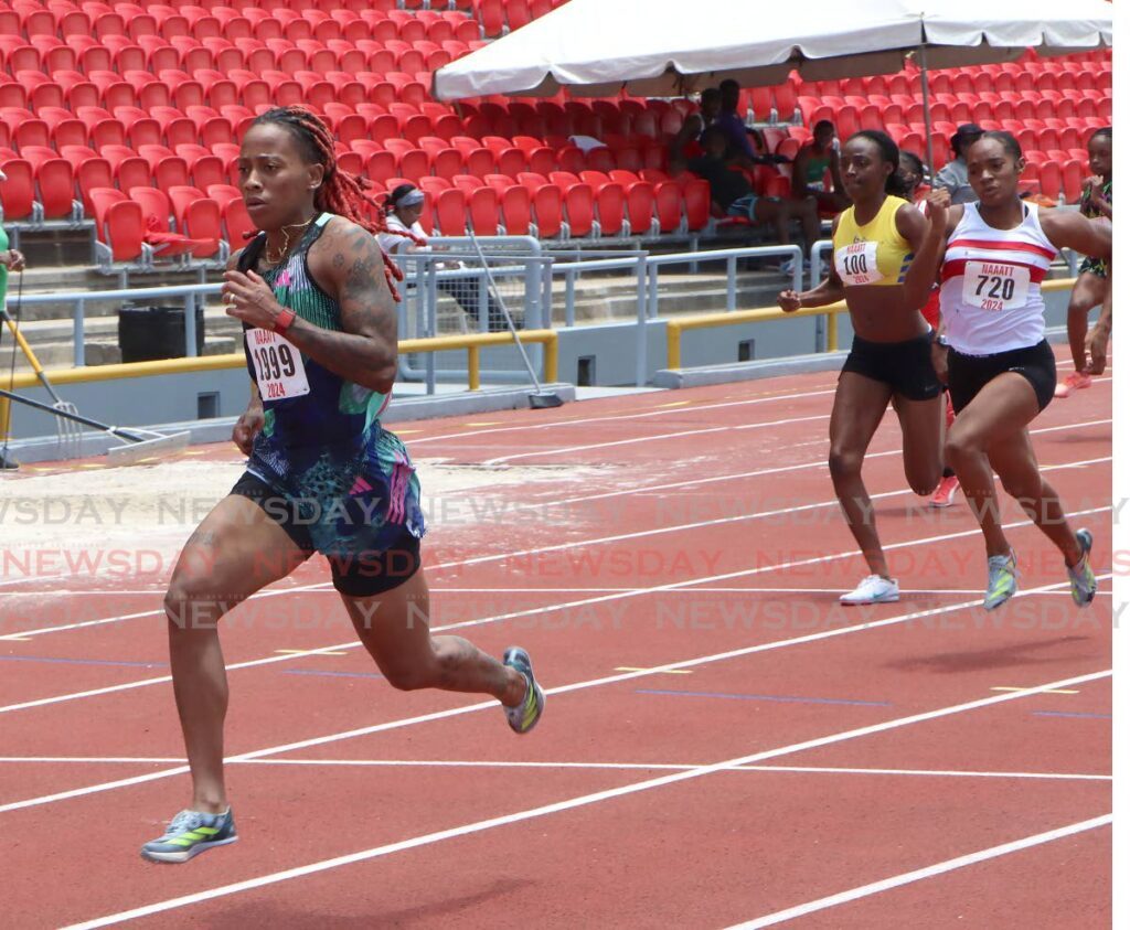 National champion Michelle-Lee Ahye easily wins her  women's 100m dash heat, in the NAAA track & field Series #3, at the Hasely Crawford Stadium on Sunday.  - Angelo Marcelle