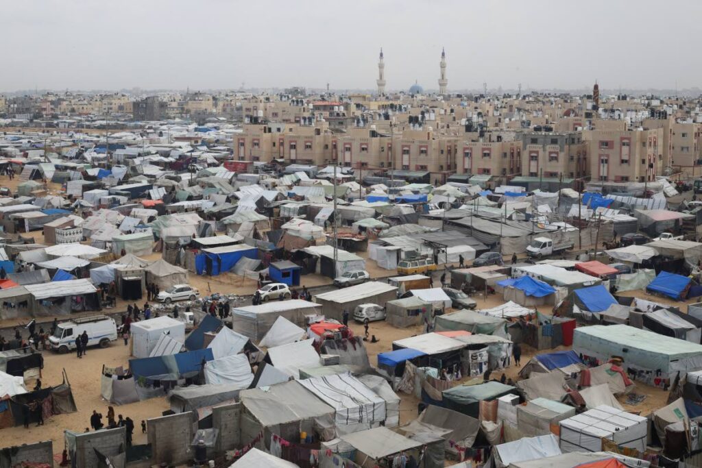 A tent camp housing Palestinians displaced by the Israeli offensive is seen in Rafah, Gaza Strip. AP Photo - 