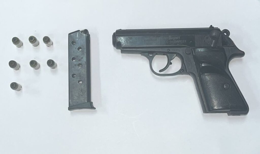 A gun and ammunition seized during a police anti-crime exercise on April 12.  - Photo courtesy TTPS