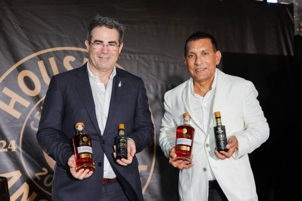 Angostura's CEO, Laurent Schun and chairman Terrence Bharath SC, reveal its 200-year anniversary limited-edition bitters and redesigned premium rum range. -
Photo courtesy Angostura 