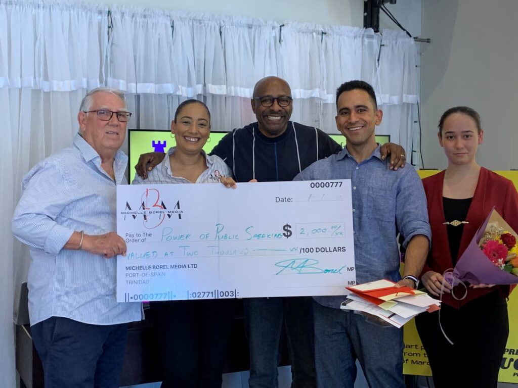 Carlos Figueira, left, managing director of Rafmon Marketing, Michelle Borel, managing director of Michelle Borel Media Ltd and Cookie Castle, Errol Fabien of Gayelle, winner Michael Soo Ping Chow and his sister, Maria. -