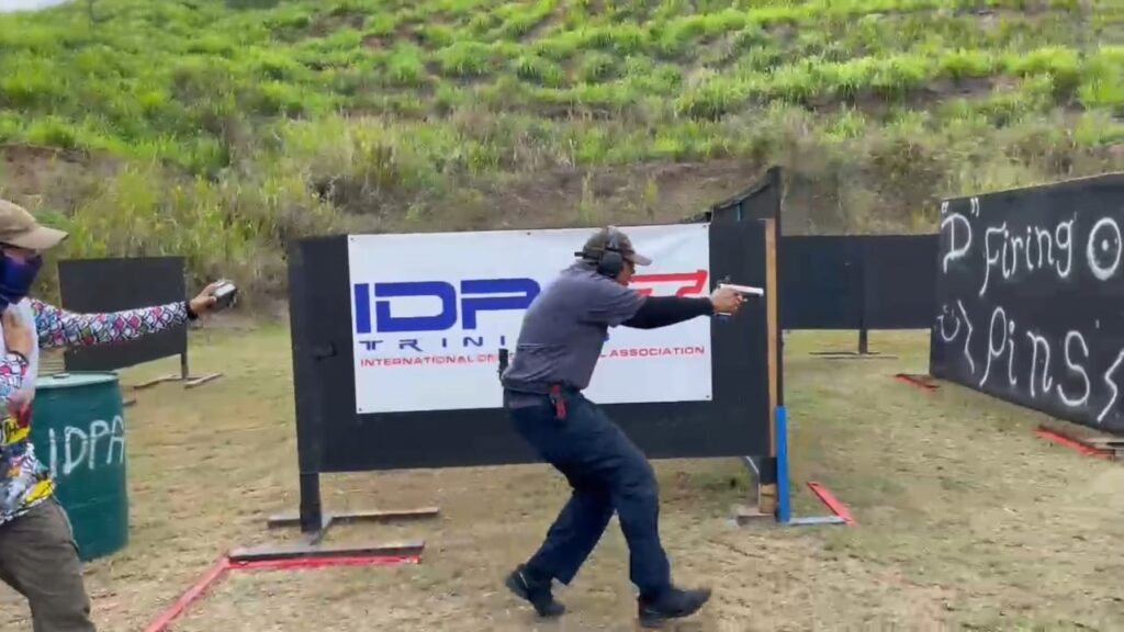 International Defensive Pistol Association (IDPA) members practice on a shooting range in Gran Couva.