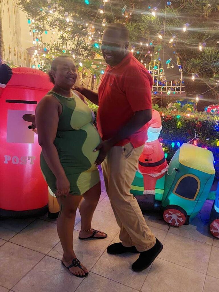 Elisha Felix and Stephen Rodney pose for a picture last Christmas prior to the birth of their daughter Azariah. Azariah died at the Port of Spain General Hospital on February 19. - 