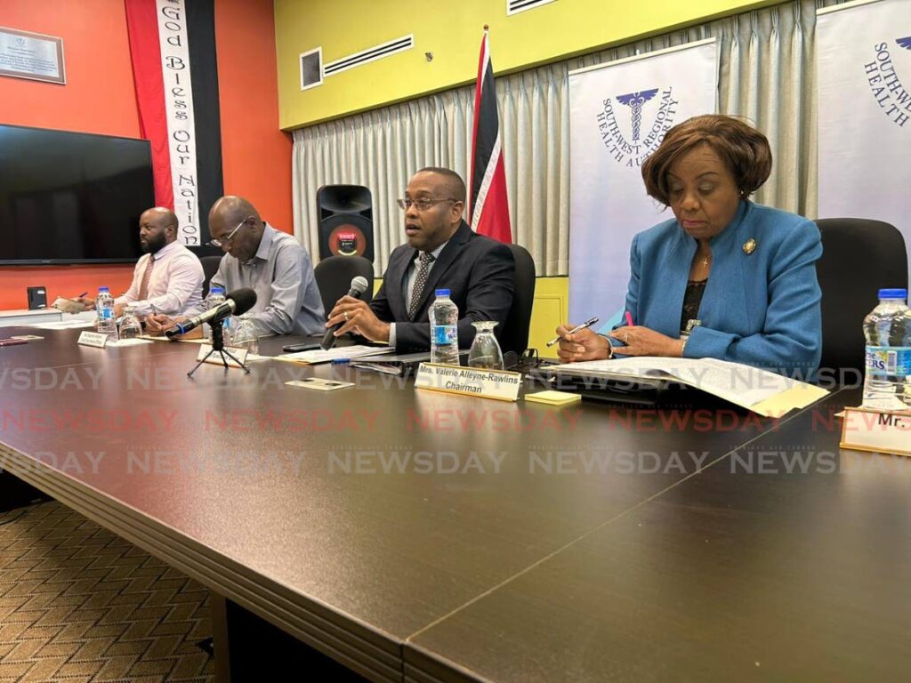 SWRHA CEO Brian Armour with other officials during a press conference at the San Fernando Teaching Hospital on April 27.  - Rishard Khan 