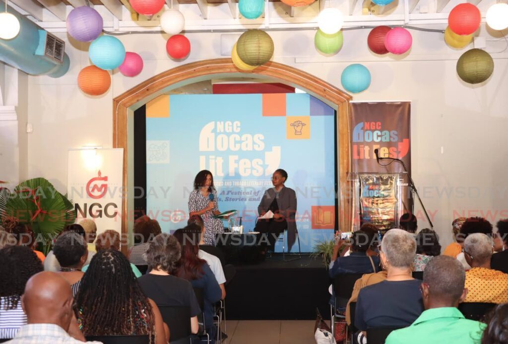 Novelist and short story writer, Edwidge Danticat, right, and host Elizabeth Walcott-Hackshaw at a one-on-one session with the author at the Bocas Lit Fest held at the Old Fire Station, NALIS, Port of Spain, on April 28. - Photo by Venessa Mohammed