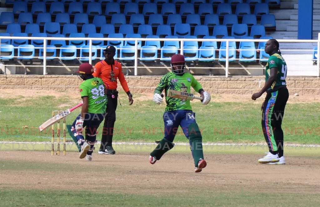 Preysal’s Adrian Cooper (2nd R) and Justin Jaggessar run between the wickets during the TTCB T20 Festival match, on April 29, at the Queen’s Parl Oval, St Clair. Clarke Road won by four wickets. - ROGER JACOB