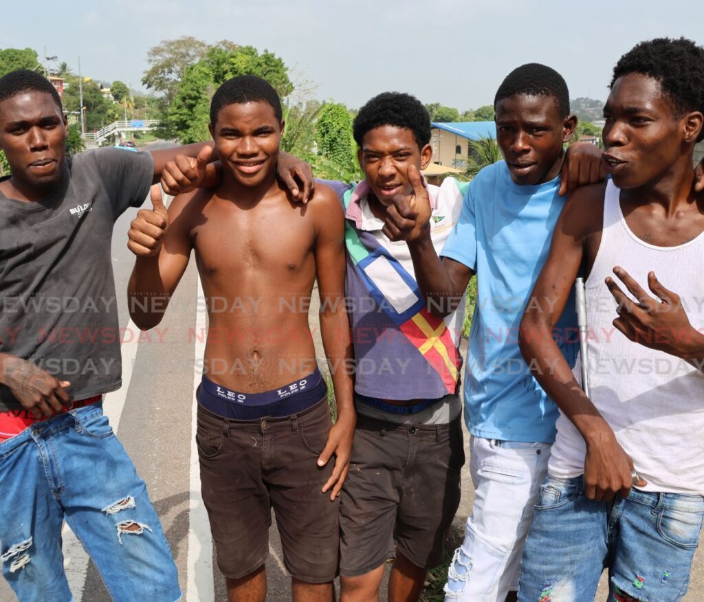 From left, Jelani Rousseau, Kabir Bernard, Joel Frank, Tishaan Charles and Tyrique Barrow; youth samaritans who rendered assistance to the injured driver and passenger of a white sedan that crashed along Lady Young Road opposite Crystal Drive in Morvant on April 21. - Photo by Roger Jacob