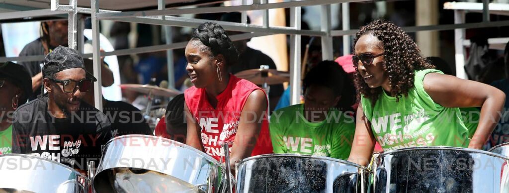 A file photo shows Merry Tones steelband performing at the Panorama small bands competition in February 2017. - 