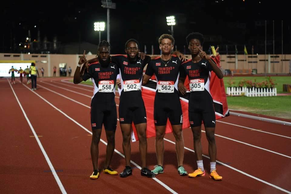 From left, TT’s Che Wickham,  Mikhail Byer, Dylan Woodruffe and Hakeem Chinapoo celebrate after winning gold in 40.45 seconds in the 4x100m Under-20 boys’ race at the Carifta Games. - File photo courtesy National Association of Athletics Administrations