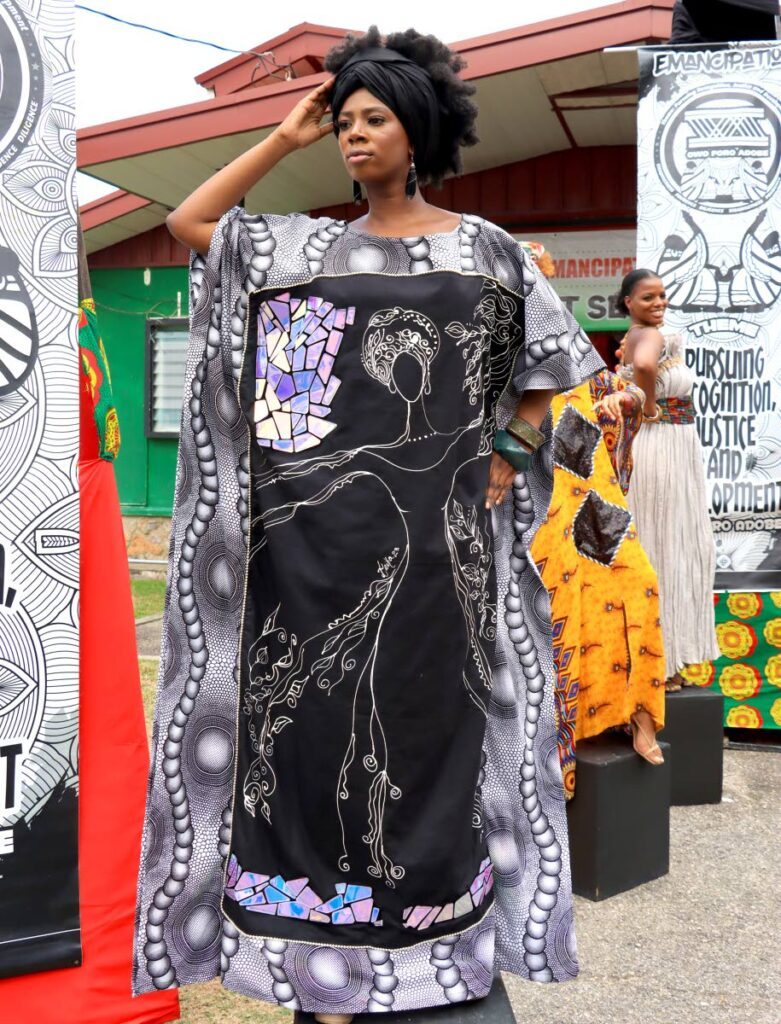 A model displays African fashion at the launch of Ewa Afrika 24 at Emancipation House, Maraval on April 18. - Venessa Mohammed