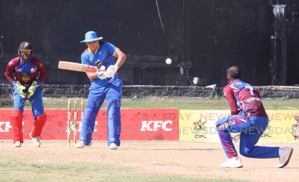 Queen's Park's Joshua Da Silva almost chips a ball back to the Powergen bowler Samuel Roopnarine in the TTCB T20 Festival semifinal, at the Queen's Park Oval, Port of Spin, Friday.  - Angelo Marcelle