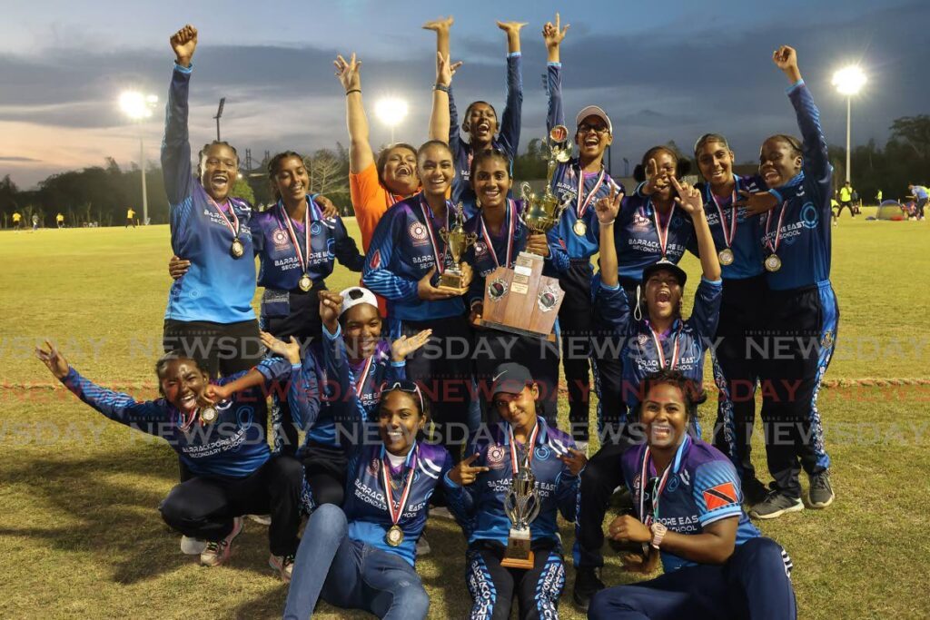 Barrackpore East Secondary School celebrate winning the Powegen Secondary School Cricket League girls T20 open final at the National Cricket Centre, Couva on Friday. - Lincoln holder 