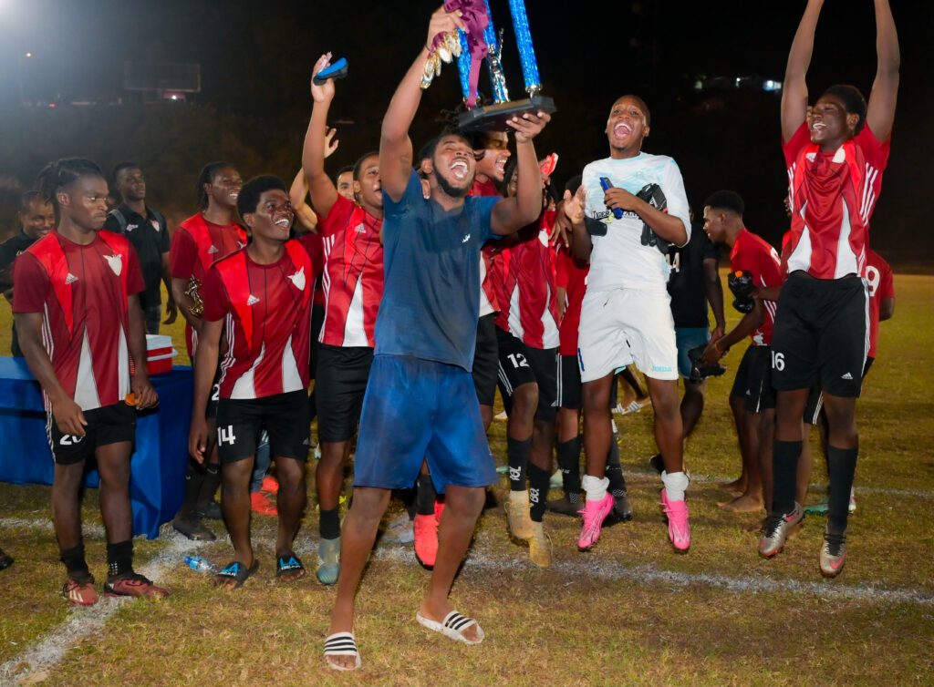 Eagles FC celebrate winning the Moriah Village Football League final at the Moriah Recreation Ground on May 4. - Phot courtesy Visuals Style