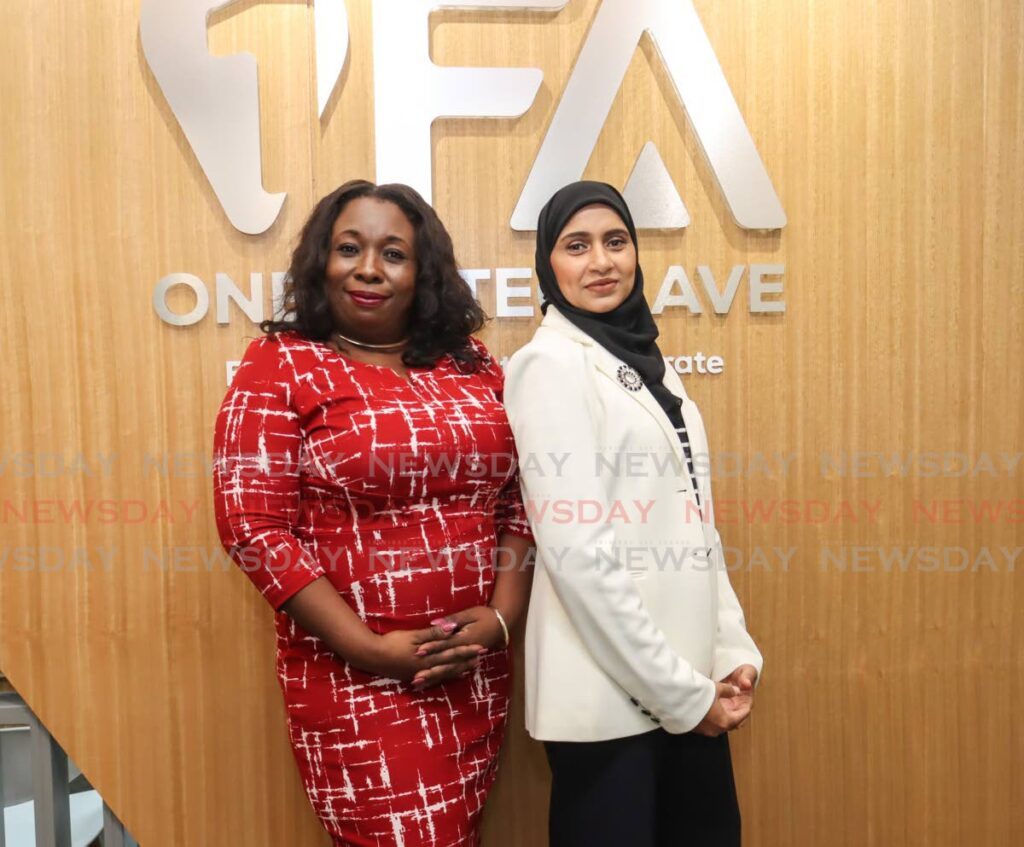 Dawn Nelson, vice president, left, and Shanaz Mohammed, manager at the TT International Financial Centre. - Faith Ayoung