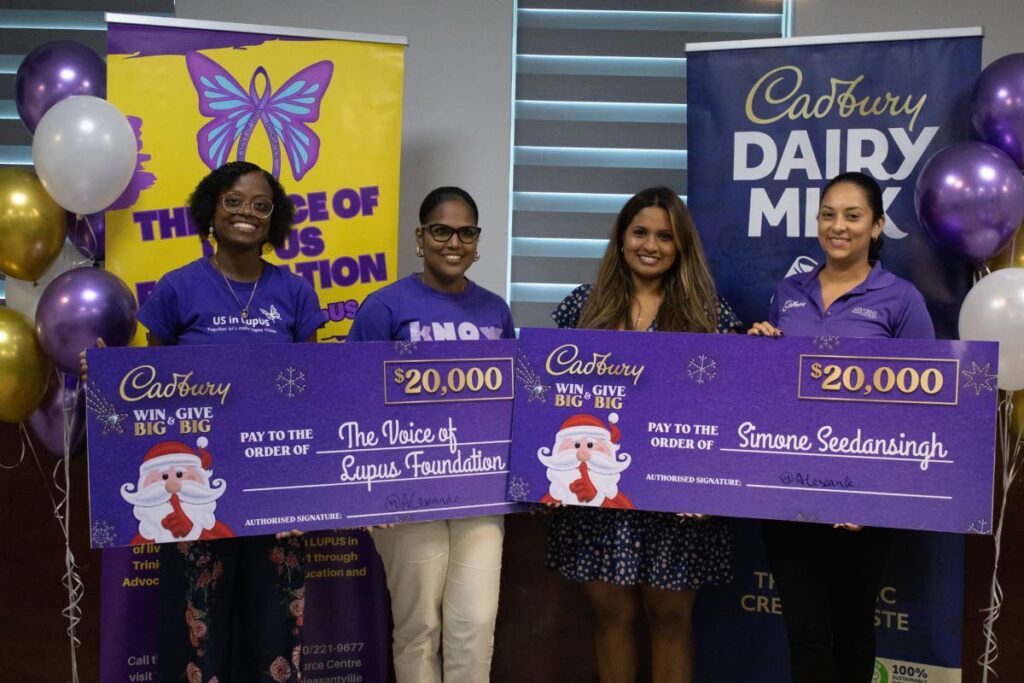 Shachia Strachan, youth ambassador for The Voice of Lupus Foundation, left; Dana Hinds Allain, ambassador for the foundation; Simone Seedansingh, Cadbury’s promotion winner; and Cherysse Alexander, AS Bryden & Sons Ltd, group product manager for Food & Grocery Division at the presentation of the cheque for the winner of the Cadbury Give and Get Promo.  - 