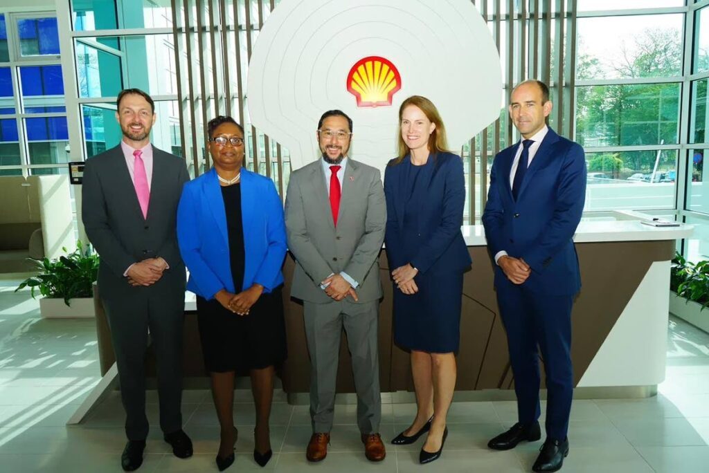 Adam Lomass, senior vice president and country chair, Shell TT, left; Penelope Bradshaw-Niles, PS, Energy Ministry; Stuart Young, Energy Minister; J Zoë Yujnovich, integrated gas and upstream director Shell; and Gary Walker, business development lead, Shell.
Photo courtesy MEEI - Ministry of Energy