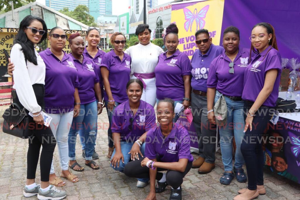 Deputy Mayor Abena Hartly, centre, at the World Lupus Day celebration, hosted by members of The Voice of Lupus Foundation, on the Brian Lara Promenade, Port of Spain, on May 10.  - Photo by Angelo Marcelle