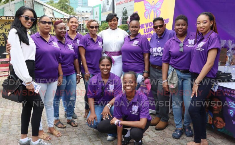 Deputy Mayor Abena Hartly, centre, at the World Lupus Day celebration, hosted by members of The Voice of Lupus Foundation, on the Brian Lara Promenade, Port of Spain, on May 10.