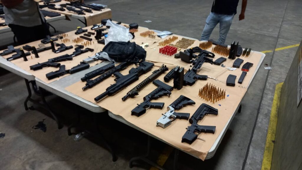 Part of the cache of weapons recovered by police at a courier bond at the Piarco airport on April 20, 2021 after a tip-off by US authorities. The guns were sent from the US.  - Photo courtesy TTPS