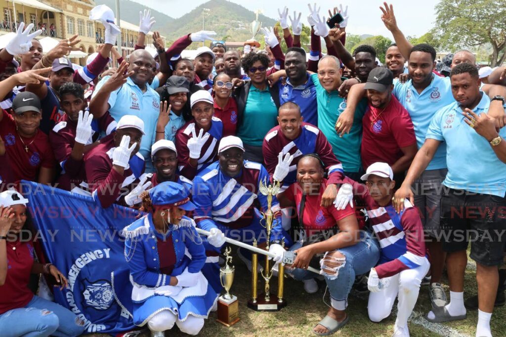 MARCH-PAST WINNERS: Police Commissioner Erla Harewood-Christopher (centre) with the Guard and Emergency Branch officers as they celebrate their march-past victory at the
Trinidad and Tobago Police Service's 101st annual sports and family day on May 11. Photo by Roger Jacob