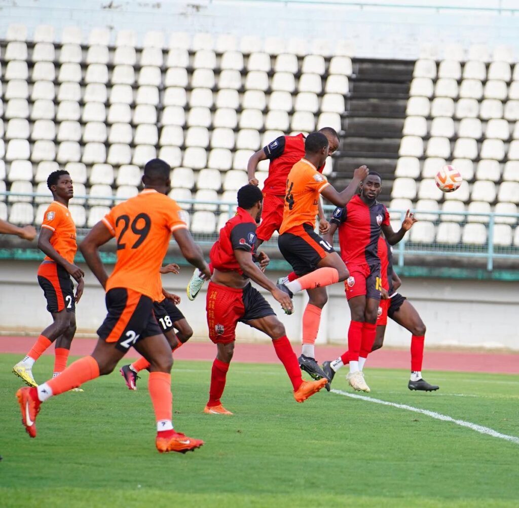 AC Port of Spain Jama Charles (top) headers in a goal against Club Sando during the TT Premier Football League match, on MAy 11, 2024, at the Larry Gomes 
Stadium, 
Malabar.  - via TTPFL