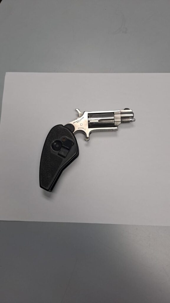 Officers of the Northern Division found a .22 Magnum Revolver in a bushy area off Malabar Trainline on May 10 - Photo courtesy TTPS