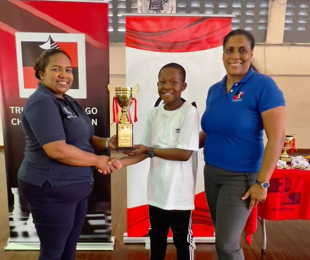 Lambeau Anglican Primary School’s Nicholas McLetchie receives his prize after topping the field at the 2024 C3 National Individual Primary Schools Chess Championship in April.  - 