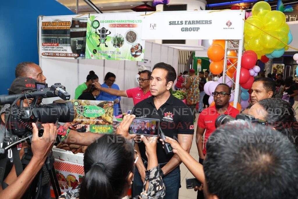 Minister of Rural Development and Local Government, Farris Al-Rawi, speaks to the media at the Food, Agriculture and Beverage Expo held at Gulf City Mall, La Romaine on Friday. - Photo by Venessa Mohammed