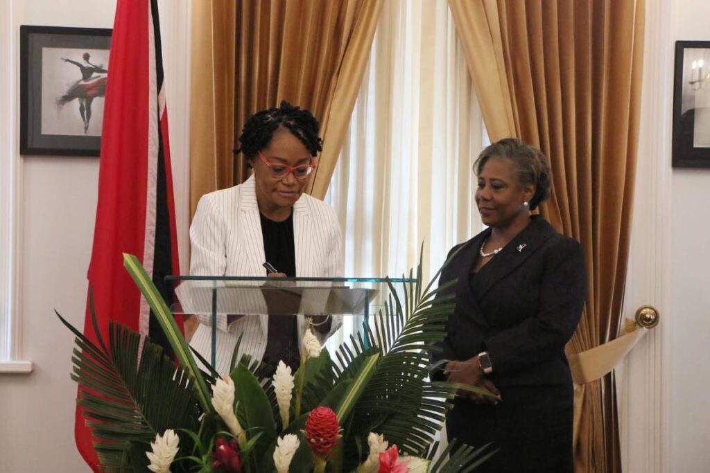 Jacqui Sampson Meiguel being sworn in by Speaker Bridgid Annisette-George on May 20. - 