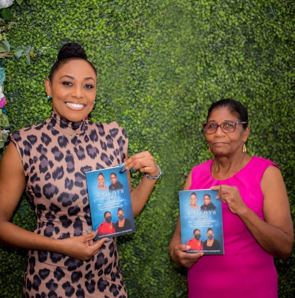 Lilian Lewis, right, and her daughter Veronica Carasquero show off their copies of Aunty Ivy’s story: How Coronavirus Changed lifestyles in 2020 – Month to Month Recall. - 