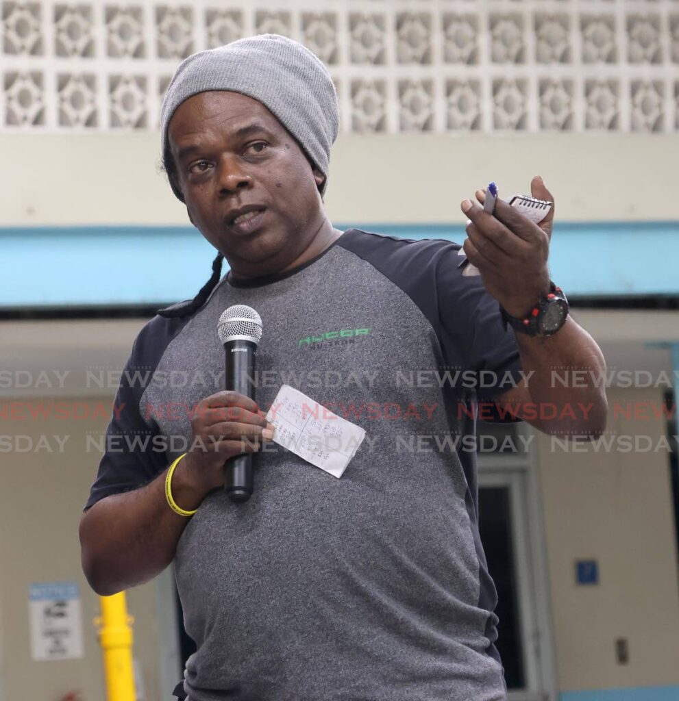 Edinburgh resident Ronnie Fort speaking at the police service townhall meeting at the Presentation College, Chaguanas on May 21.  - Photo by Roger Jacob