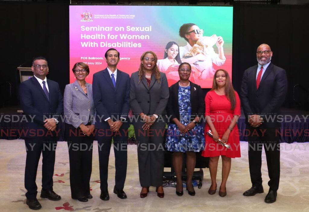 From left, Sanjay Singh, deputy permanent secretary at the Office of the Prime Minister - Gender and Child Affairs, Vera Deonanan-Balkaran, deputy permanent secretary at the Ministry of Social Development and Family Services, Ryan Ramcharan, permanent secretary at the Ministry of Social Development and Family Services, Lenor Baptiste-Simmons, permanent secretary at the Ministry of Social Development and Family Services, Wendy Guy-Hernandez, deputy permanent secretary at the Ministry of Social Development and Family Services, Tessa Pascall, disability affairs specialist, Disability Affairs Unit at the Ministry of Social Development and Family Services, Michael Reid, deputy permanent secretary for the Ministry of Health at the Seminar on Sexual and Reproductive Health for Women with Disabilities at the Hyatt Regency Hotel, Wrightson Road, Port of Spain on May 22. - Photo by Faith Ayoung